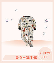 Load image into Gallery viewer, Beige Sleep 'N Play features allover dino print with black trim