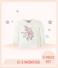 Load image into Gallery viewer, Ivory shirt features screen and puff print purple floral art with text "dream come true"